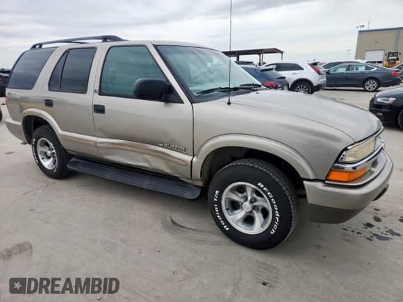 2002 Chevrolet Blazer LS with VIN 1GNCS13W32K129233, listed as a Copart auction lot 63417545 with 202,670 mi miles and Salvage title. Bid and sale history available at DreamBid. Image 4.
