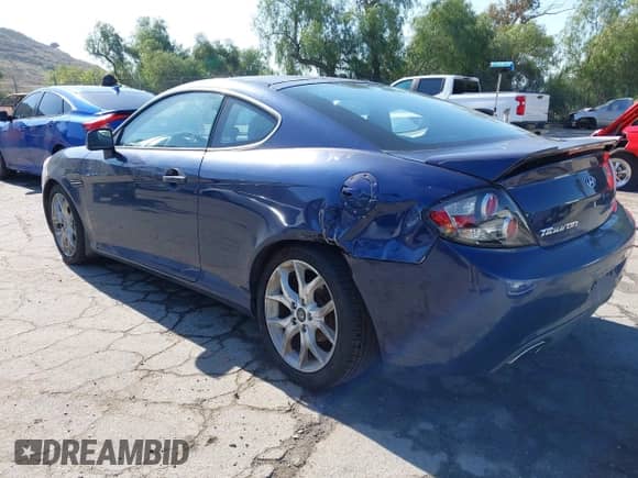2007 Hyundai Tiburon GT с VIN KMHHN66F47U250875, выставлен на аукционе IAAI как лот 41999150 с пробегом 65 401 миль миль и . История ставок и продаж доступна на DreamBid. Изображение 3.
