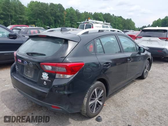 2020 Subaru Impreza Premium with VIN 4S3GTAV61L3732312, listed as a IAAI auction lot 42494432 with 118,419 mi miles and . Bid and sale history available at DreamBid. Image 4.