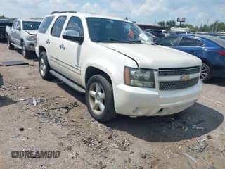 2011 Chevrolet Tahoe LTZ with VIN 1GNSCCE07BR383452, listed as a IAAI auction lot 43137193 with 219,990 mi miles and . Bid and sale history available at DreamBid. Image 1.