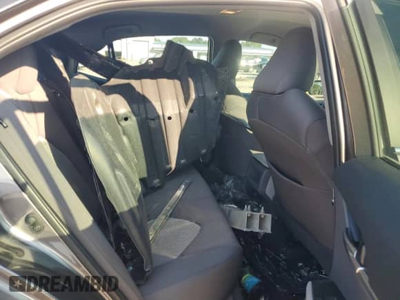 2019 Toyota Camry LE с VIN 4T1B11HK5KU794289, выставлен на аукционе Copart как лот 69141015 с пробегом 43 768 миль миль и Списание • Salvage title. История ставок и продаж доступна на DreamBid. Изображение 10.