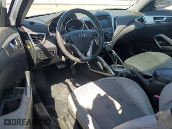 2012 Hyundai Veloster w/Black Int z VIN KMHTC6AD1CU037673, wystawiony jako Copart lot #71550475 z przebiegiem 204 000 mil mil oraz Szkoda całkowita • Salvage title. Historia ofert i sprzedaży dostępna na DreamBid. Obrazek 8.