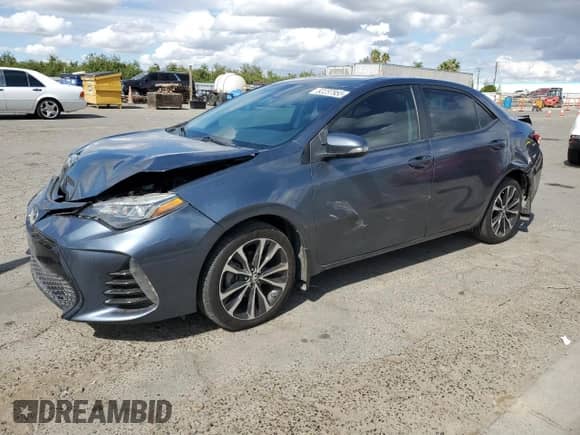 2019 Toyota Corolla LE with VIN 5YFBURHE6KP868062, listed as a Copart auction lot 82237955 with 155,418 mi miles and Salvage title. Bid and sale history available at DreamBid. Image 1.