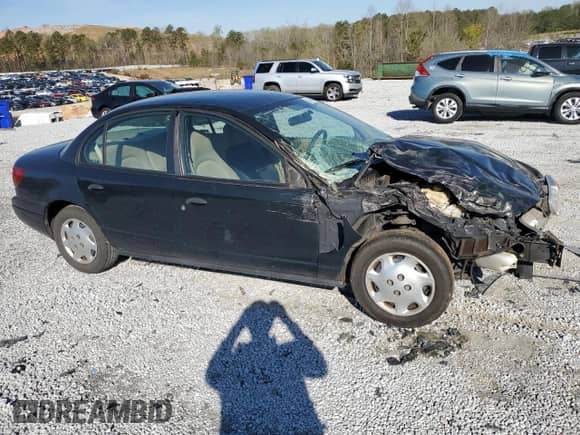 2002 Saturn SL with VIN 1G8ZG54842Z165557, listed as a Copart auction lot 50699145 with Not provided miles and Salvage title. Bid and sale history available at DreamBid. Image 4.