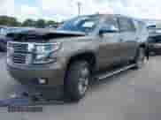 2015 Chevrolet Tahoe LTZ with VIN 1GNSCCKC1FR599320, listed as a IAAI auction lot 43093837 with 124,751 mi miles and . Bid and sale history available at DreamBid. Image 17.