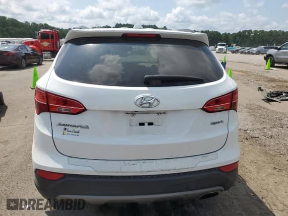 2015 Hyundai Santa Fe with VIN 5XYZU3LB9FG236076, listed as a Copart auction lot 67263405 with 219,677 mi miles and Salvage title. Bid and sale history available at DreamBid. Image 6.