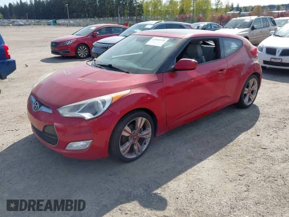 2012 Hyundai Veloster w/Black Int с VIN KMHTC6AD4CU077164, выставлен на аукционе IAAI как лот 42053970 с пробегом 122 657 миль миль и . История ставок и продаж доступна на DreamBid. Изображение 2.