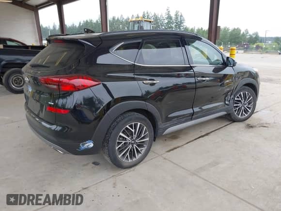 2021 Hyundai Tucson Limited with VIN KM8J3CAL1MU283119, listed as a IAAI auction lot 42479059 with 50,026 mi miles and . Bid and sale history available at DreamBid. Image 4.