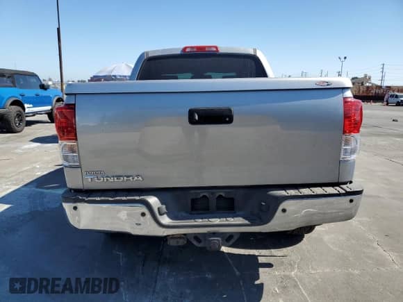 2010 Toyota Tundra Limited z VIN 5TFFY5F18AX078860, wystawiony jako Copart lot #66655125 z przebiegiem 158 273 mil mil oraz Szkoda całkowita • Salvage title. Historia ofert i sprzedaży dostępna na DreamBid. Obrazek 6.