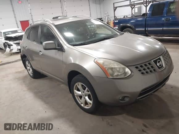 2010 Nissan Rogue S with VIN JN8AS5MV6AW142826, listed as a IAAI auction lot 43211959 with 118,458 mi miles and . Bid and sale history available at DreamBid. Image 1.