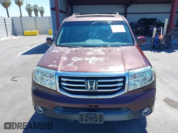 2014 Honda Pilot EX-L with VIN 5FNYF3H5XEB009008, listed as a IAAI auction lot 43024881 with 119,646 mi miles and . Bid and sale history available at DreamBid. Image 12.