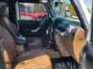 2014 Jeep Wrangler Sahara z VIN 1C4AJWBG3EL197444, wystawiony jako Copart lot #64733055 z przebiegiem 193 278 mil mil oraz Czysty tytuł • Clean title. Historia ofert i sprzedaży dostępna na DreamBid. Obrazek 5.