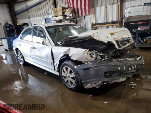 2002 Hyundai Sonata с VIN KMHWF25S32A669287, выставлен на аукционе Copart как лот 49255655 с пробегом 97 278 миль миль и Списание • Salvage title. История ставок и продаж доступна на DreamBid. Изображение 4.