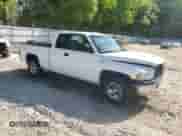 2000 Dodge 1500 with VIN 3B7HC13Y3YG144442, listed as a Copart auction lot 53854025 with 205,754 mi miles and Salvage title. Bid and sale history available at DreamBid. Image 4.