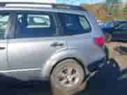 2012 Subaru Forester X z VIN JF2SHABC8CH409577, wystawiony jako IAAI lot #43490487 z przebiegiem 143 372 mil mil oraz . Historia ofert i sprzedaży dostępna na DreamBid. Obrazek 14.