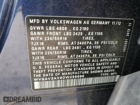 2013 Volkswagen Tiguan SE z VIN WVGAV3AX9DW056696, wystawiony jako Copart lot #54721695 z przebiegiem 108 656 mil mil oraz Szkoda całkowita • Salvage title. Historia ofert i sprzedaży dostępna na DreamBid. Obrazek 13.