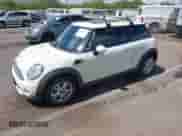 2012 MINI Hardtop with VIN WMWSU3C50CT255544, listed as a IAAI auction lot 42533243 with 102,422 mi miles and . Bid and sale history available at DreamBid. Image 2.