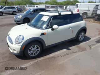 2012 MINI Hardtop with VIN WMWSU3C50CT255544, listed as a IAAI auction lot 42533243 with 102,422 mi miles and . Bid and sale history available at DreamBid. Image 2.