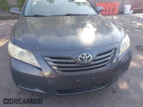 2009 Toyota Camry with VIN 4T1BE46K69U805870, listed as a IAAI auction lot 43234527 with 210,811 mi miles and . Bid and sale history available at DreamBid. Image 6.