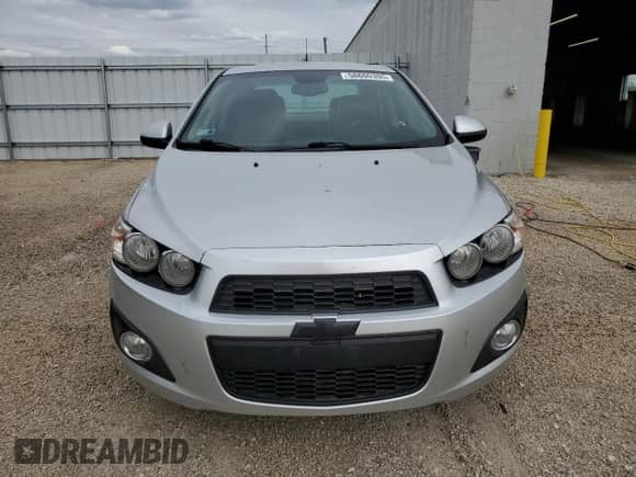 2013 Chevrolet Sonic LTZ с VIN 1G1JE5SH7D4152807, выставлен на аукционе Copart как лот 58600395 с пробегом 129 542 миль миль и Списание • Salvage title. История ставок и продаж доступна на DreamBid. Изображение 5.