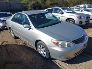 2003 Toyota Camry XLE with VIN 4T1BE32K33U732593, listed as a IAAI auction lot 43377243 with 171,286 mi miles and . Bid and sale history available at DreamBid. Image 1.