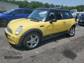 2005 MINI Hardtop with VIN WMWRC33405TJ64236, listed as a Copart auction lot 59877415 with 136,950 mi miles and Salvage title. Bid and sale history available at DreamBid. Image 1.
