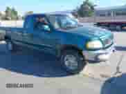 1997 Ford F-150 XL with VIN 1FTDX1861VKA99001, listed as a IAAI auction lot 43214637 with 201,282 mi miles and . Bid and sale history available at DreamBid. Image 1.