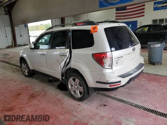 2010 Subaru Forester X Premium with VIN JF2SH6CC1AH732684, listed as a Copart auction lot 83993475 with Not provided miles and Salvage title. Bid and sale history available at DreamBid. Image 2.