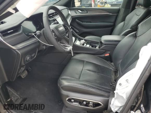 2023 Jeep Grand Cherokee Overland z VIN 1C4RJHDG0PC670537, wystawiony jako Copart lot #56757285 z przebiegiem 24 735 mil mil oraz Szkoda całkowita • Salvage title. Historia ofert i sprzedaży dostępna na DreamBid. Obrazek 7.