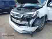 2020 Honda Pilot EX z VIN 5FNYF6H37LB047115, wystawiony jako IAAI lot #42833904 z przebiegiem 77 857 mil mil oraz . Historia ofert i sprzedaży dostępna na DreamBid. Obrazek 6.