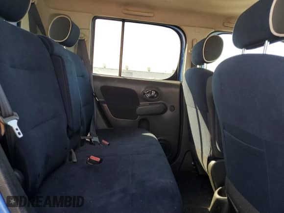 2012 Nissan Cube S z VIN JN8AZ2KR6CT255731, wystawiony jako Copart lot #70279975 z przebiegiem Nie podano mil oraz Szkoda całkowita • Salvage title. Historia ofert i sprzedaży dostępna na DreamBid. Obrazek 10.