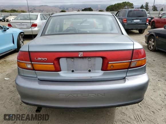 2002 Saturn LS with VIN 1G8JU54F32Y529705, listed as a Copart auction lot 71895554 with 60,088 mi miles and Salvage title. Bid and sale history available at DreamBid. Image 6.