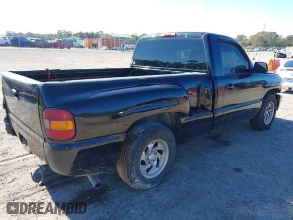 2002 Chevrolet Silverado 1500 with VIN 1GCEC14V22Z138422, listed as a IAAI auction lot 40975500 with Not provided miles and . Bid and sale history available at DreamBid. Image 4.