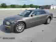 2009 Chrysler 300 C Hemi with VIN 2C3LA63T99H600547, listed as a Copart auction lot 54793715 with 241,729 mi miles and Salvage title. Bid and sale history available at DreamBid. Image 1.