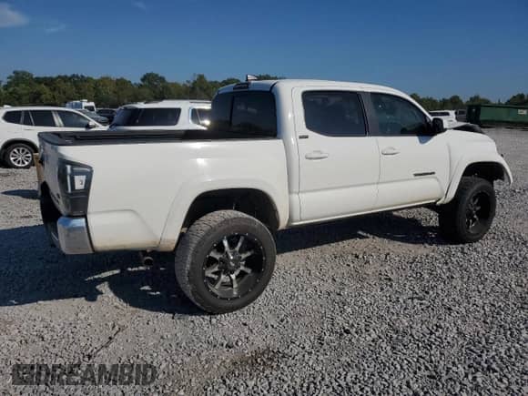 2021 Toyota Tacoma SR5 with VIN 3TYAZ5CN6MT005354, listed as a Copart auction lot 70816115 with 144,733 mi miles and Salvage title. Bid and sale history available at DreamBid. Image 3.