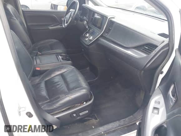 2015 Toyota Sienna SE with VIN 5TDXK3DC5FS583833, listed as a IAAI auction lot 41577726 with 143,965 mi miles and . Bid and sale history available at DreamBid. Image 5.