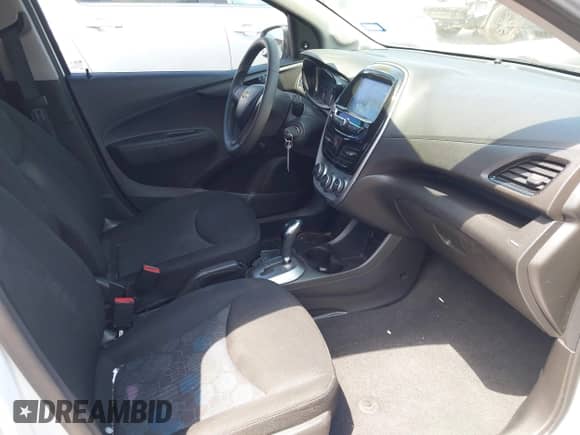 2016 Chevrolet Spark LS with VIN KL8CB6SA2GC565688, listed as a IAAI auction lot 42397545 with 54,438 mi miles and . Bid and sale history available at DreamBid. Image 5.