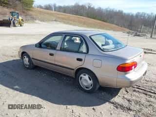 1999 Chevrolet Prizm z VIN 1Y1SK5487XZ434983, wystawiony jako IAAI lot #41486316 z przebiegiem 163 702 mil mil oraz . Historia ofert i sprzedaży dostępna na DreamBid. Obrazek 3.