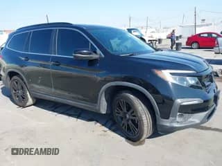 2021 Honda Pilot Special Edition z VIN 5FNYF5H2XMB034765, wystawiony jako IAAI lot #43093531 z przebiegiem 60 160 mil mil oraz . Historia ofert i sprzedaży dostępna na DreamBid. Obrazek 1.