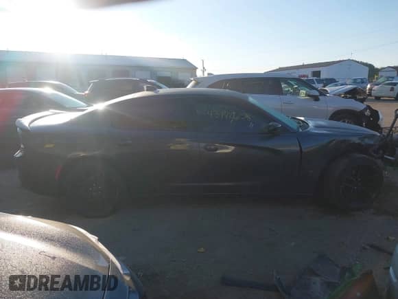 2016 Dodge Charger SXT с VIN 2C3CDXHG6GH318856, выставлен на аукционе IAAI как лот 43142658 с пробегом 107 431 миль миль и . История ставок и продаж доступна на DreamBid. Изображение 14.