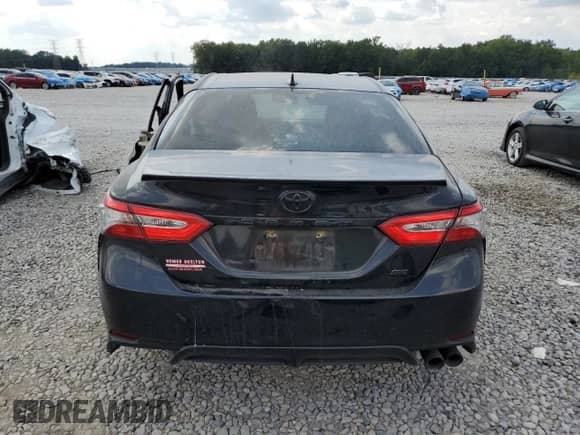 2019 Toyota Camry LE с VIN 4T1B11HK6KU820267, выставлен на аукционе Copart как лот 80095685 с пробегом Не указан миль и Списание • Salvage title. История ставок и продаж доступна на DreamBid. Изображение 6.
