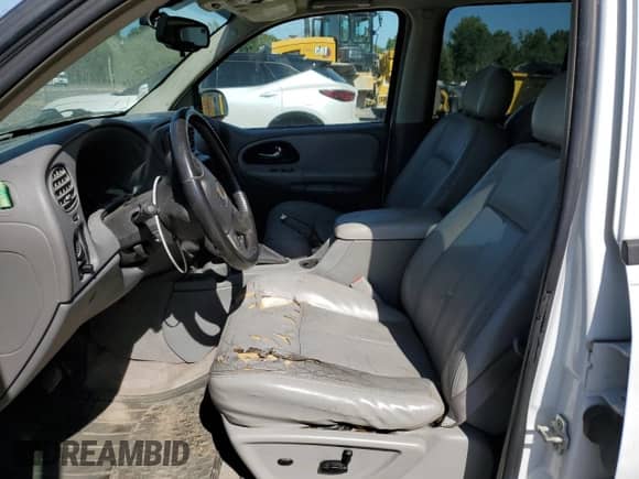 2005 Chevrolet TrailBlazer LT с VIN 1GNET16S056207320, выставлен на аукционе Copart как лот 81544955 с пробегом 237 909 миль миль и Списание • Salvage title. История ставок и продаж доступна на DreamBid. Изображение 7.