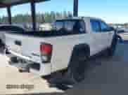 2019 Toyota Tacoma SR with VIN 5TFCZ5AN5KX183237, listed as a IAAI auction lot 43316097 with 115,212 mi miles and . Bid and sale history available at DreamBid. Image 4.