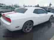 2013 Dodge Challenger SXT with VIN 2C3CDYAG7DH736726, listed as a IAAI auction lot 41530042 with 129,259 mi miles and . Bid and sale history available at DreamBid. Image 4.