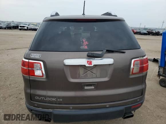 2007 Saturn Outlook XR с VIN 5GZER33787J173032, выставлен на аукционе Copart как лот 59374715 с пробегом 164 314 миль миль и Списание • Salvage title. История ставок и продаж доступна на DreamBid. Изображение 6.