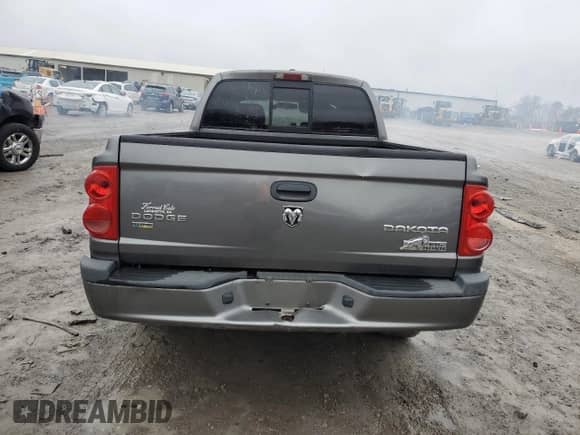 2010 Dodge Dakota Bighorn/Lonestar z VIN 1D7CW3GP5AS130822, wystawiony jako Copart lot #42523155 z przebiegiem 103 081 mil mil oraz Szkoda całkowita • Salvage title. Historia ofert i sprzedaży dostępna na DreamBid. Obrazek 6.