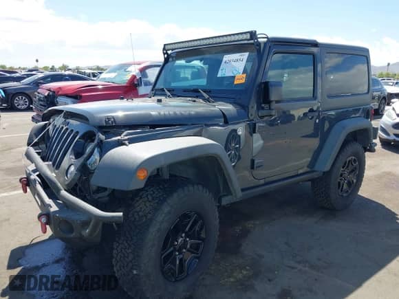 2018 Jeep Wrangler Sport z VIN 1C4AJWAG3JL889621, wystawiony jako IAAI lot #42034854 z przebiegiem 61 505 mil mil oraz . Historia ofert i sprzedaży dostępna na DreamBid. Obrazek 2.