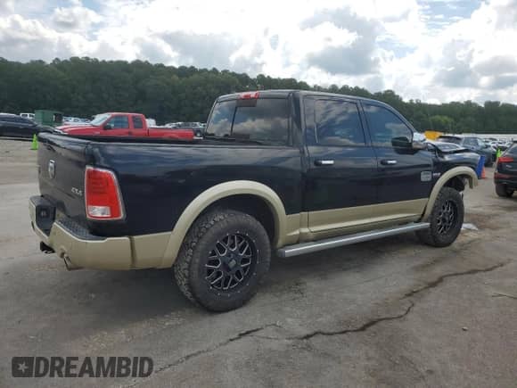 2014 Ram 1500 Longhorn z VIN 1C6RR7PTXES479469, wystawiony jako Copart lot #67517725 z przebiegiem 189 231 mil mil oraz Szkoda całkowita • Salvage title. Historia ofert i sprzedaży dostępna na DreamBid. Obrazek 3.