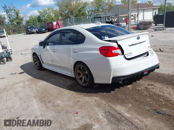 2017 Subaru WRX with VIN JF1VA1B6XH9802885, listed as a IAAI auction lot 43150614 with 74,476 mi miles and . Bid and sale history available at DreamBid. Image 3.