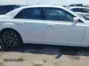 2014 Chrysler 300 S with VIN 2C3CCABT3EH276200, listed as a IAAI auction lot 43015483 with 112,424 mi miles and . Bid and sale history available at DreamBid. Image 13.